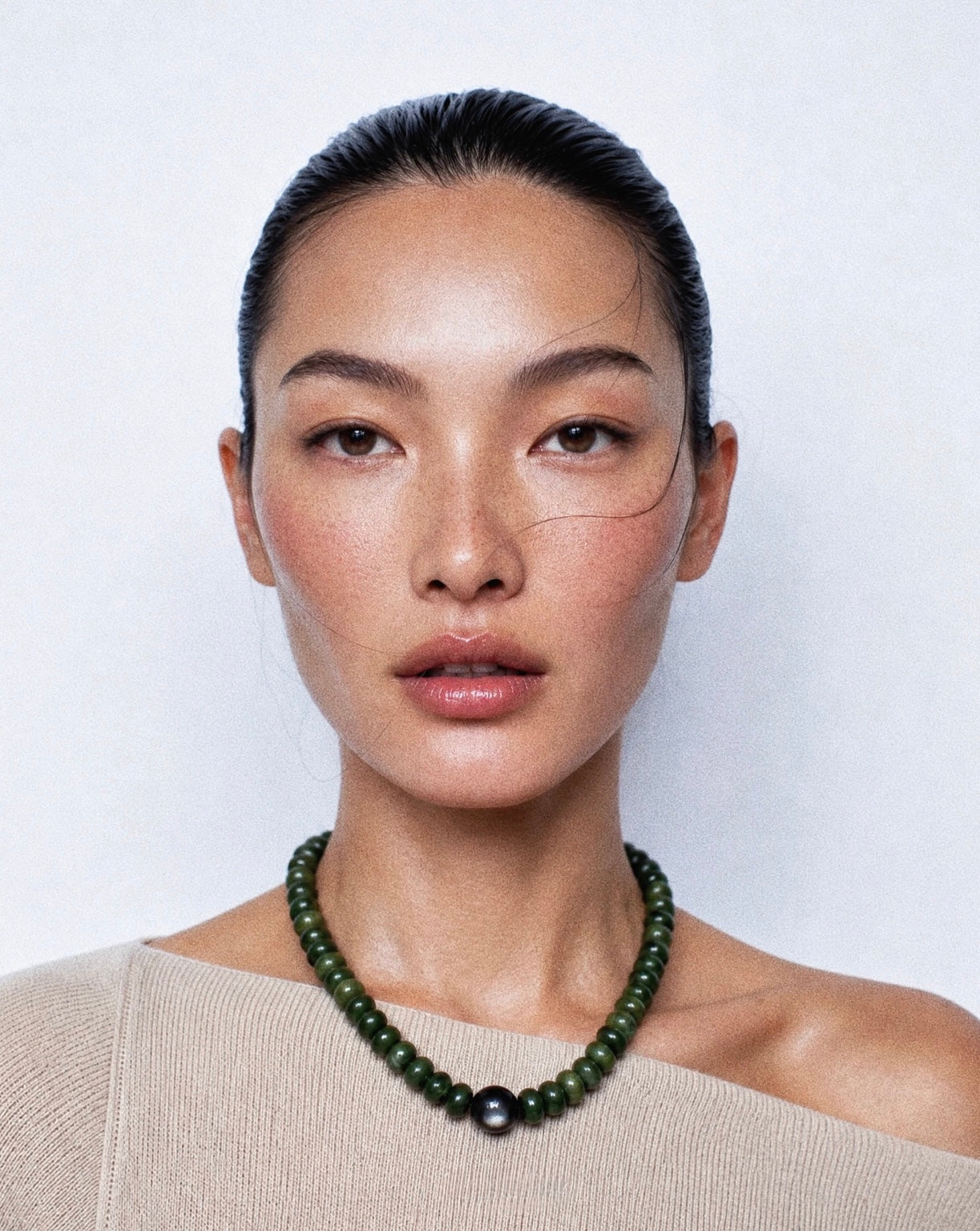 Model wearing an AMOR FATI natural stone necklace
